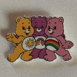 NWT. Handmade Pin Brooch of Three Care Bears in Purple Pink and Yellow!